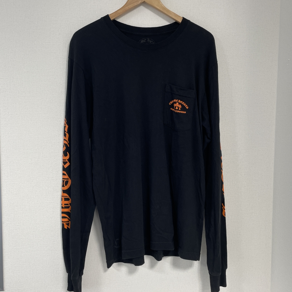 クロムハーツのブラック×オレンジ セメタリークロス L/S Tシャツの買取実績です。