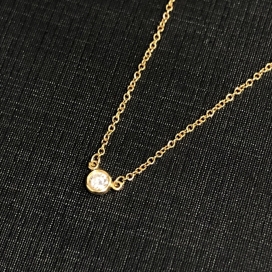 ティファニーのK18 0.1ct ダイヤ バイザヤード ネックレスの買取実績です。